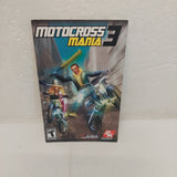 A used PlayStation 2 manual for the game Motocross Mania 3, showing the cover with a character and motorcycles.