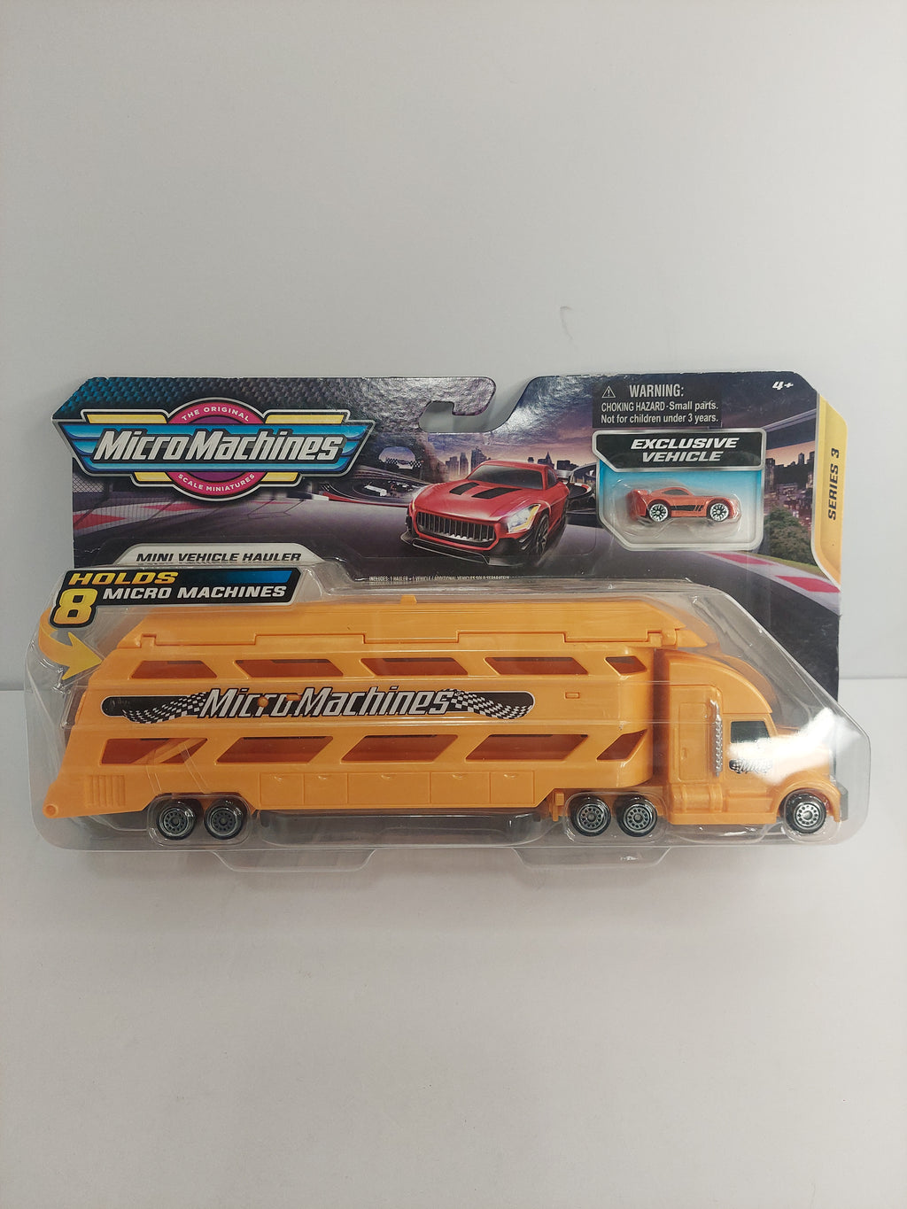 The Original Micro Machines Orange Mini Vehicle Hauler Series 3