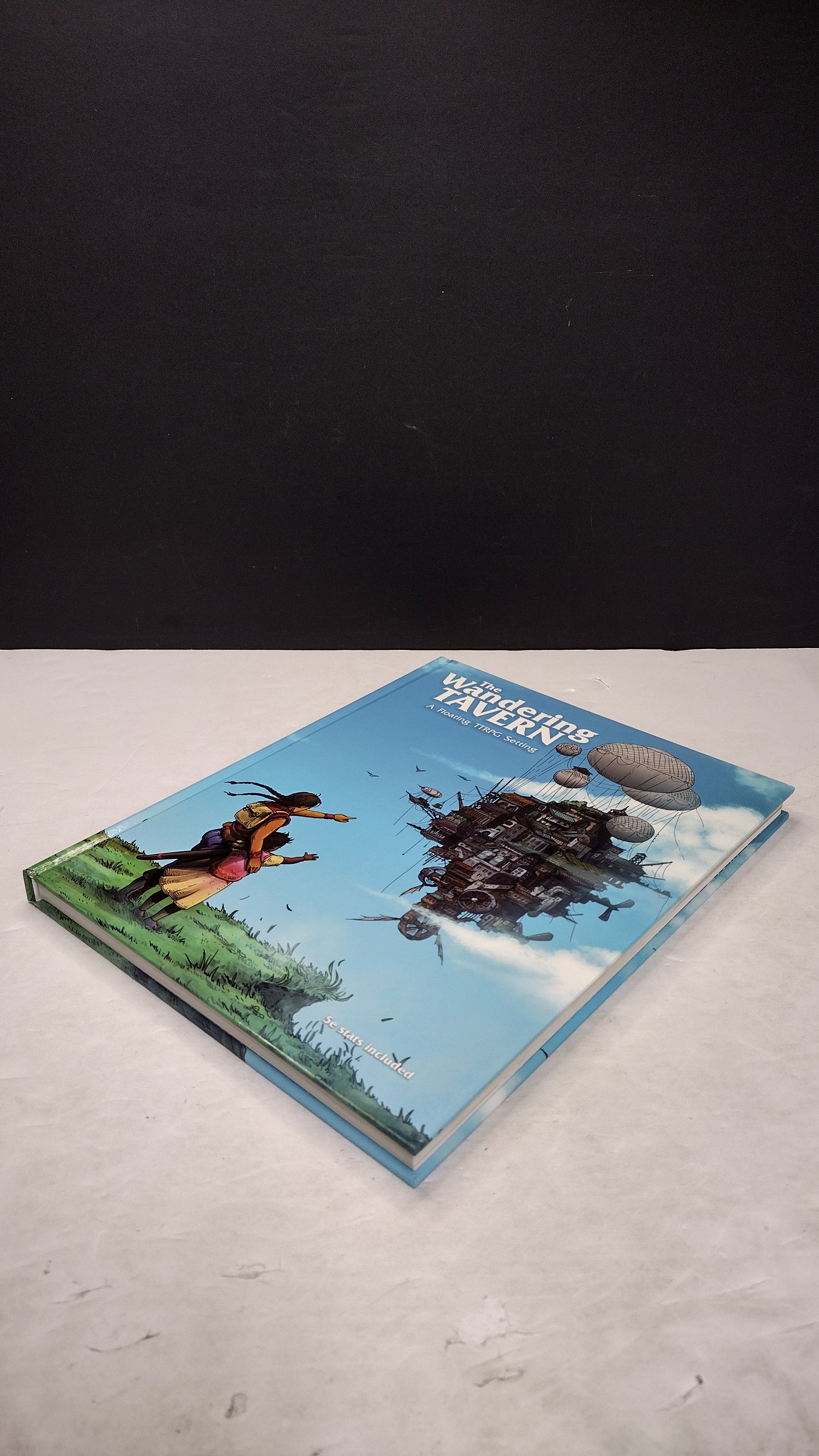 The Wandering Tavern RPG: Setting Book Hardcover (Brand New, Unsealed - Great Condition)