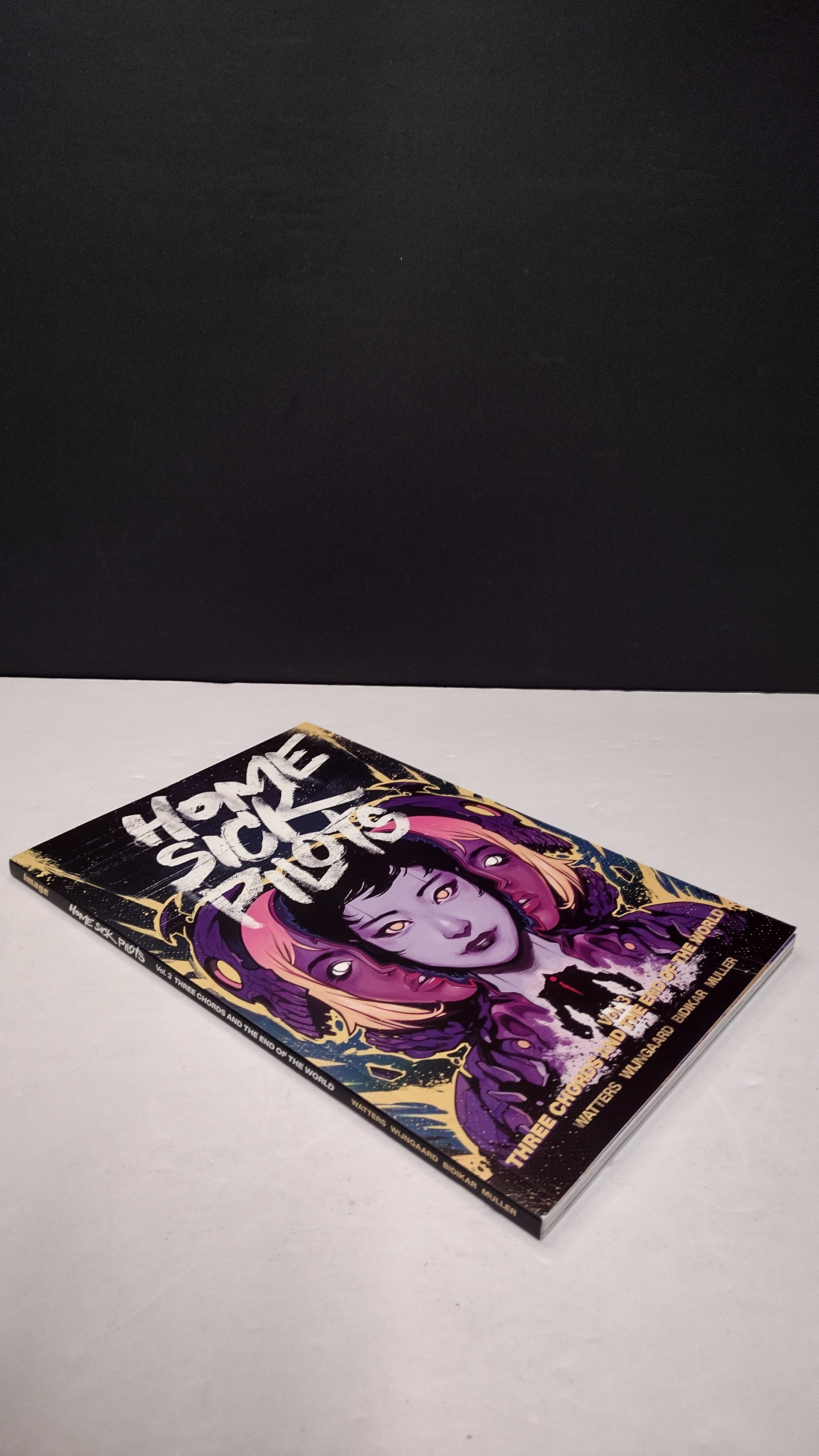 (MATURE) Home Sick Pilots Volume 3: Three Chords and the End of the World by Dan Watters – New Paperback
