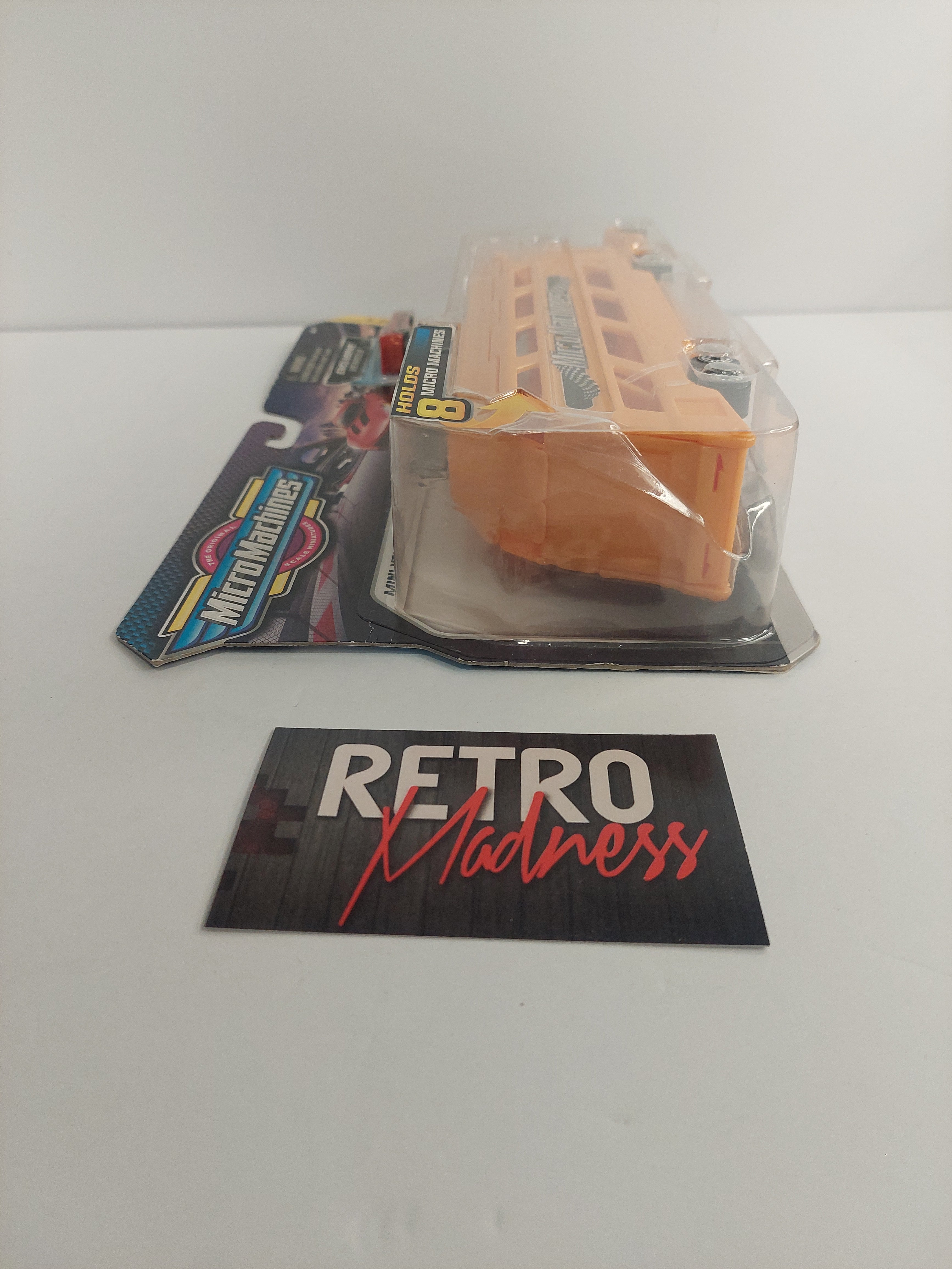 The Original Micro Machines Orange Mini Vehicle Hauler Series 3