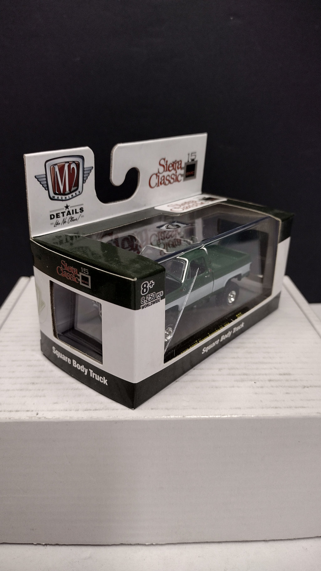 Modern 2020s M2 Machines Sierra Classic 1976 GMC Sierra Grande 15 4x4 (Green/White) 1:64 (New in Acrylic Box - Factory Sealed)