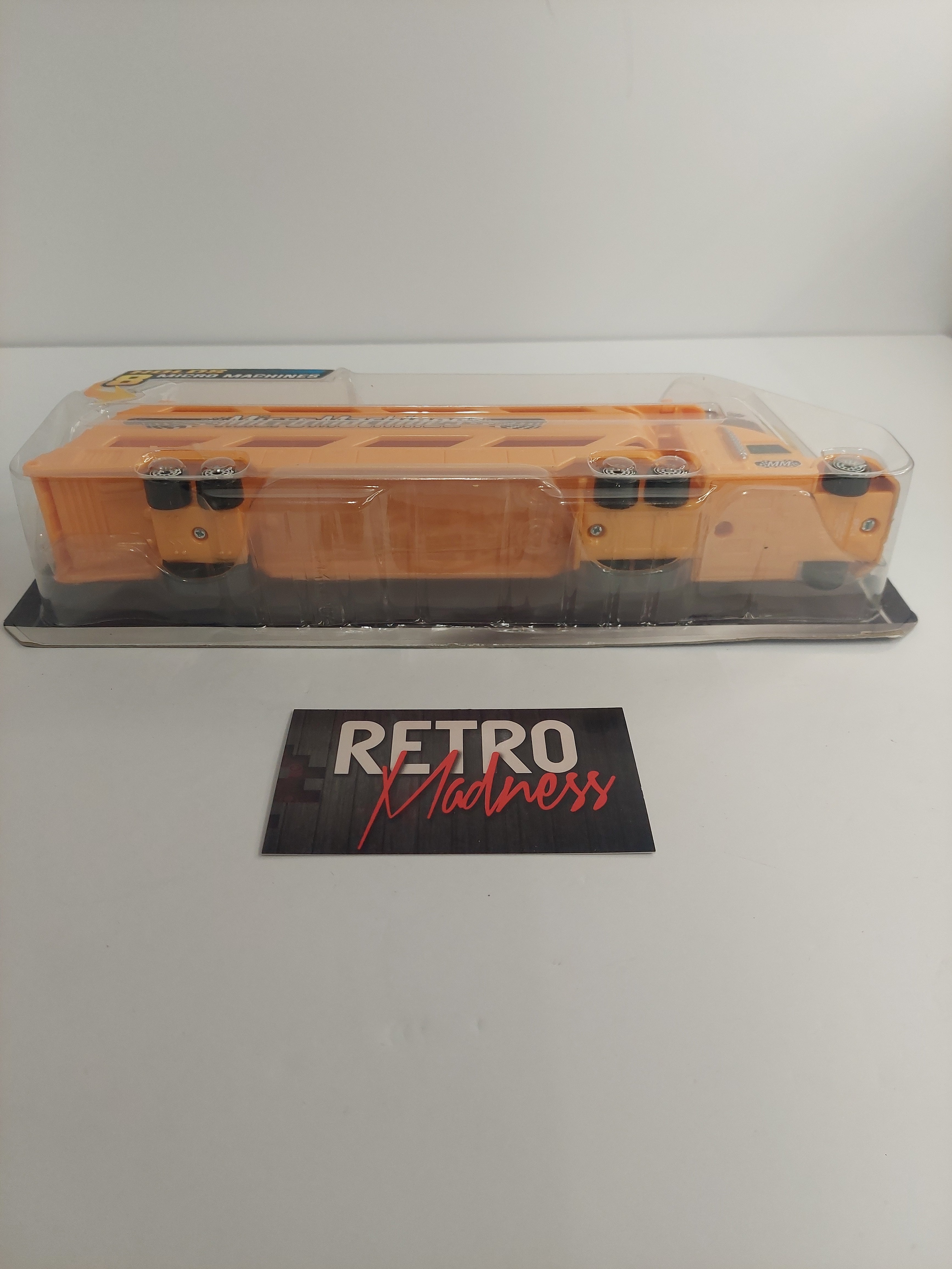 The Original Micro Machines Orange Mini Vehicle Hauler Series 3