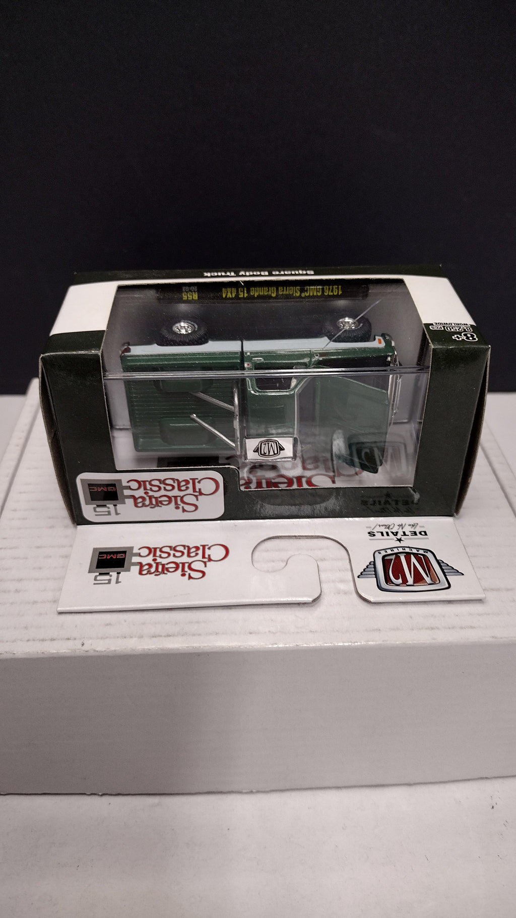 Modern 2020s M2 Machines Sierra Classic 1976 GMC Sierra Grande 15 4x4 (Green/White) 1:64 (New in Acrylic Box - Factory Sealed)