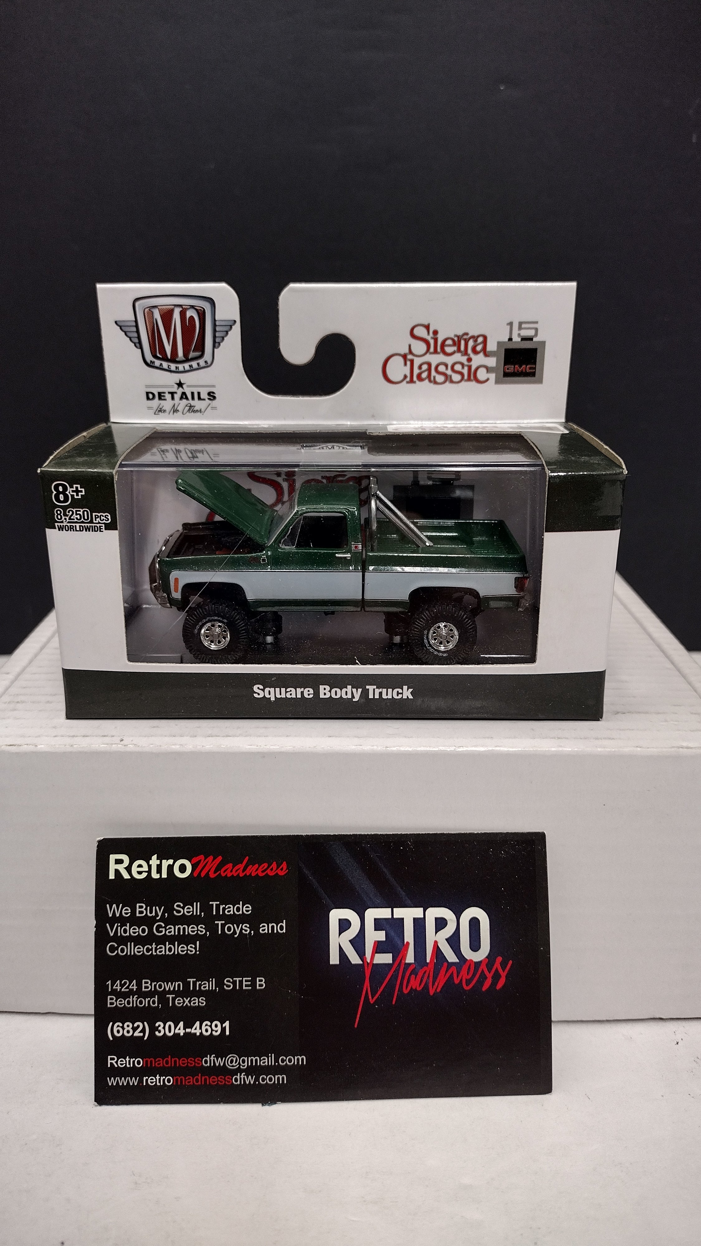 Modern 2020s M2 Machines Sierra Classic 1976 GMC Sierra Grande 15 4x4 (Green/White) 1:64 (New in Acrylic Box - Factory Sealed)