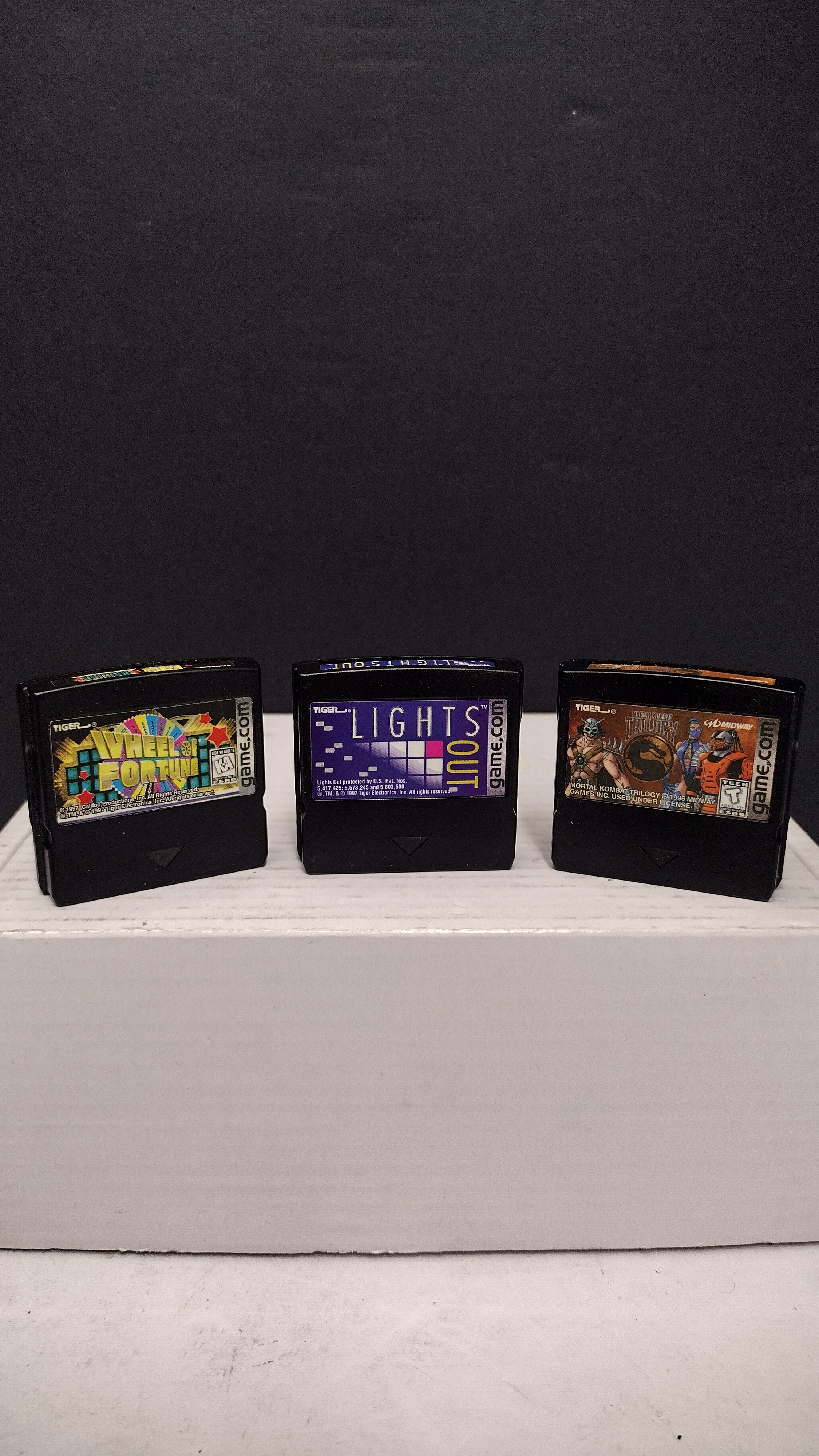 Vintage 1997 Tiger Electronics Game.com 3-Game Cartridge Lot (Mortal Kombat Trilogy, Lights Out, & Wheel of Fortune) - Tested & Working