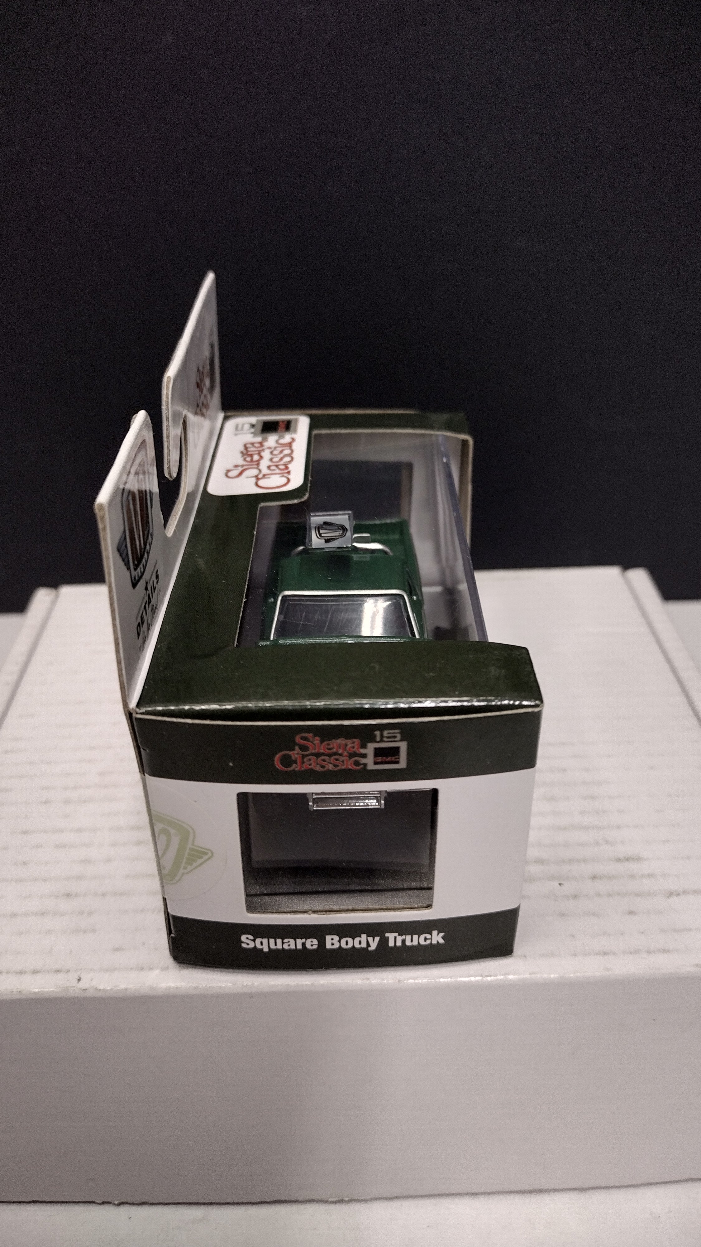 Modern 2020s M2 Machines Sierra Classic 1976 GMC Sierra Grande 15 4x4 (Green/White) 1:64 (New in Acrylic Box - Factory Sealed)